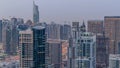 Aerial top view of Dubai Marina night to day timelapse. Modern towers and traffic on the road Royalty Free Stock Photo