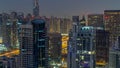 Aerial top view of Dubai Marina night to day timelapse. Modern towers and traffic on the road Royalty Free Stock Photo