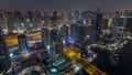 Aerial top view of Dubai Marina night to day timelapse. Modern towers and traffic on the road Royalty Free Stock Photo