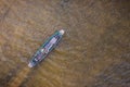 Aerial top view fishing boat traditional at Freshwater lake day time.