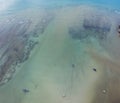 .aerial top view fishing boats parking on the beach during low tide at Rawai beach Phuket Thailand Royalty Free Stock Photo