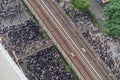 Aerial top view of flash mobs protesters demonstration rally on street road against government, crowd of people in Bangkok City,