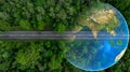 Aerial top view of green forest tree and global globe, Tropical rain forest tree ecosystem and healthy environment, Texture and Royalty Free Stock Photo