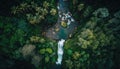 Aerial top view of healthy green mountain with waterfall and river, surface of mountain, greenery scene, fresh air and environment