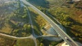 Aerial Top View of highway intersection junction summer morning with car Royalty Free Stock Photo