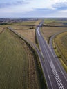 Aerial Top View of highway intersection junction summer morning with car Royalty Free Stock Photo