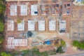 Aerial top view of homes or houses in village under construction site with structure. Top view of precast concrete slap floor. Royalty Free Stock Photo