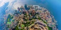 Aerial top view of Hong Kong Downtown, republic of china. Financial district and business centers in smart urban city in Asia.