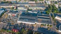 Aerial top view of industrial park zone from above, factory chimneys and warehouses, industry district