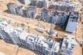 Aerial top view of industrial tower crane at construction site Royalty Free Stock Photo