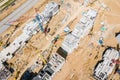 Aerial top view of industrial tower cranes at construction site Royalty Free Stock Photo