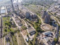 Aerial top view of heat electric station with steam coming from