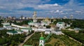 Aerial top view of Kiev Pechersk Lavra churches on hills from above, cityscape of Kyiv, Ukraine