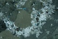 Aerial top view of a large pile of garbage. Pile of garbage on an illegal elemental garbage dump or on landfill, Many household