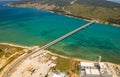 Aerial top view of a long bridge above a sea, island Ciovo in Croatia Royalty Free Stock Photo