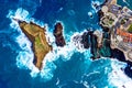 Aerial top view of Madeira island with Atlantic ocean waves crashing to the cliffs Royalty Free Stock Photo