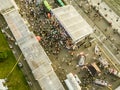 Aerial top view of massive people crowd in city