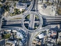 Aerial top view of multilevel junction ring road as seen in Attiki Odos, Athens