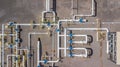 Aerial top view natural gas pipeline, gas industry, gas transport system, stop valves and appliances for gas pumping station.