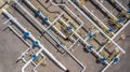 Aerial top view natural gas pipeline, gas industry, gas transport system, stop valves and appliances for gas pumping station.