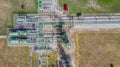 Aerial top view natural gas pipeline, gas industry, gas transport system, stop valves and appliances for gas pumping station Royalty Free Stock Photo