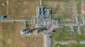 Aerial top view natural gas pipeline, gas industry, gas transport system, stop valves and appliances for gas pumping station Royalty Free Stock Photo