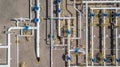 Aerial top view natural gas pipeline, gas industry, gas transport system, stop valves and appliances for gas pumping station. Royalty Free Stock Photo