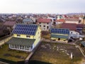 Aerial top view of new modern residential house cottage with blue shiny solar photo voltaic panels system on roof. Renewable Royalty Free Stock Photo