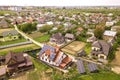 Aerial top view of new modern residential house cottage with blue shiny solar photo voltaic panels system on roof. Renewable Royalty Free Stock Photo