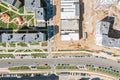 Aerial top view of new residential area with multilevel parking garage under construction Royalty Free Stock Photo