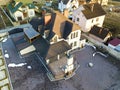 Aerial top view of new residential house cottage with shingle roof on fenced big yard on sunny day Royalty Free Stock Photo