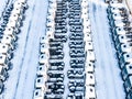 Aerial top view of new truck cars parking for sale stock lot row, dealer inventory import and export business commercial, Automobi Royalty Free Stock Photo