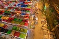 Aerial top view of Night Market people walking street, Colorful tents in the train of Ratchada at Bangkok city, Thailand. Rerail Royalty Free Stock Photo