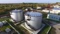Aerial top view oil storage tanks. Stock. Top view of the large oil tanks