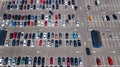 Aerial top view of parking lot with many cars from above, transportation concept Royalty Free Stock Photo