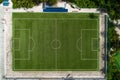 Aerial top view play-field. Empty soccer stadium green field from drone. Football field from above