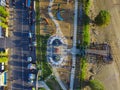 Aerial Top View Of A Playground With Roads besides it, stalls and crowd