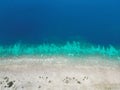 Aerial top view of a pristine sandy beach in Indonesia Royalty Free Stock Photo