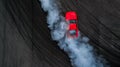 Aerial top view professional driver drift car on asphalt track w Royalty Free Stock Photo