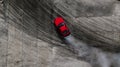 Aerial top view professional driver drifting car on asphalt road track with white smoke, Automobile race car drift on abstract Royalty Free Stock Photo