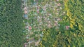 Aerial top view of residential area summer houses in forest from above, countryside real estate and dacha village in Ukraine Royalty Free Stock Photo