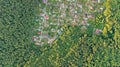 Aerial top view of residential area summer houses in forest from above, countryside real estate and small dacha village in Ukraine Royalty Free Stock Photo