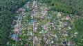Aerial top view of residential area summer houses in forest from above, countryside real estate and small dacha village in Ukraine Royalty Free Stock Photo