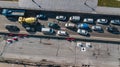 Aerial top view of road automobile traffic jam of many cars from above, block and road repair, city transportation