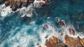 Aerial top view of rocks in sea, blue waves crashing on ocean islands Royalty Free Stock Photo