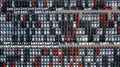 Aerial top view rows of new cars parked in distribution center on car factory, Automobile and automotive car parking lot for Royalty Free Stock Photo