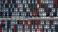 Aerial top view rows of new cars parked in distribution center on car factory, Automobile and automotive car parking lot for Royalty Free Stock Photo