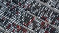 Aerial top view rows of new cars parked in distribution center on car factory, Automobile and automotive car parking lot for Royalty Free Stock Photo