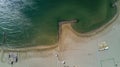 Aerial top view of sandy beach of Mediterranean sea from above, vacation and holiday resort Royalty Free Stock Photo