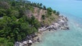 Aerial top view of sea coastline and island with palm trees Royalty Free Stock Photo